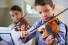 Musica - Bambini al violino (da internet)